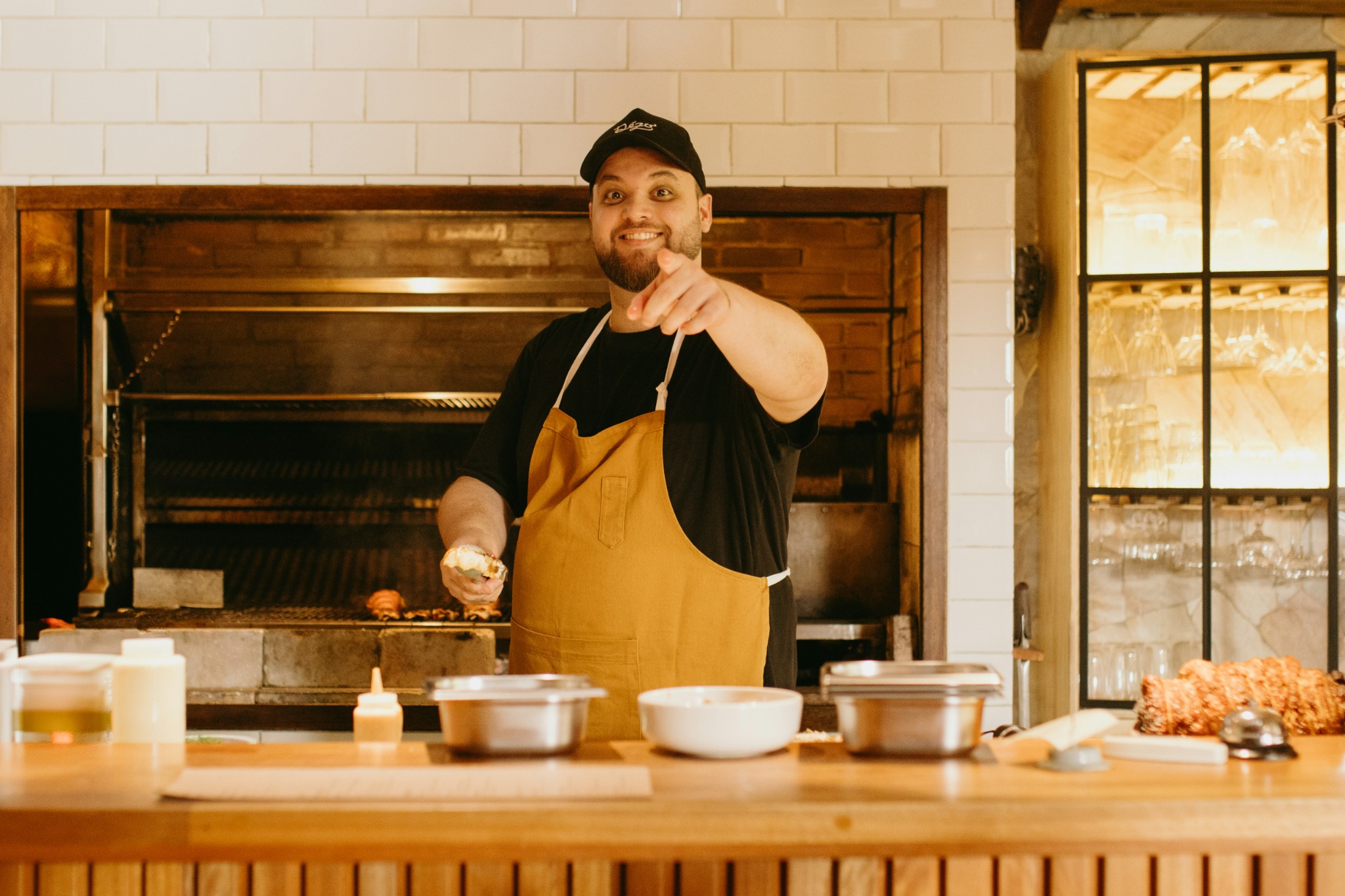 A smiling cook in his kitchen